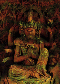 A multi-armed figure holding, among things, a hatchet